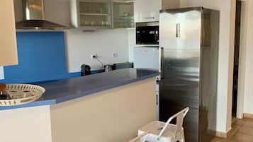 Microwave, dishwasher, coffee/tea maker, cookware/dishes/utensils