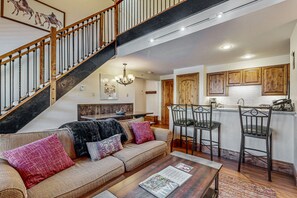 TV, fireplace, books