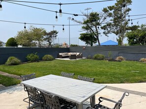 Outdoor dining - Ocean Ave 5BR: Huge Fenced Yard, Pet Friendly, 2 Houses to Beach + Shark Park! (Brigantine)