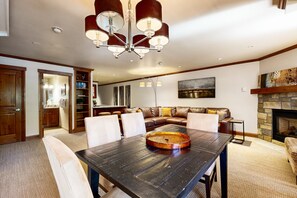 TV, fireplace, books