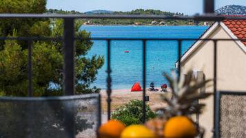 Enjoy breathtaking views of the coastline from this balcony.