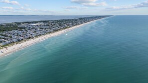 A coastal residential area with houses along the beach and a clear view of the ocean. - Corolla Beach Retreat with a Pool! (Corolla)