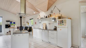 Fridge, stovetop, dishwasher, coffee/tea maker