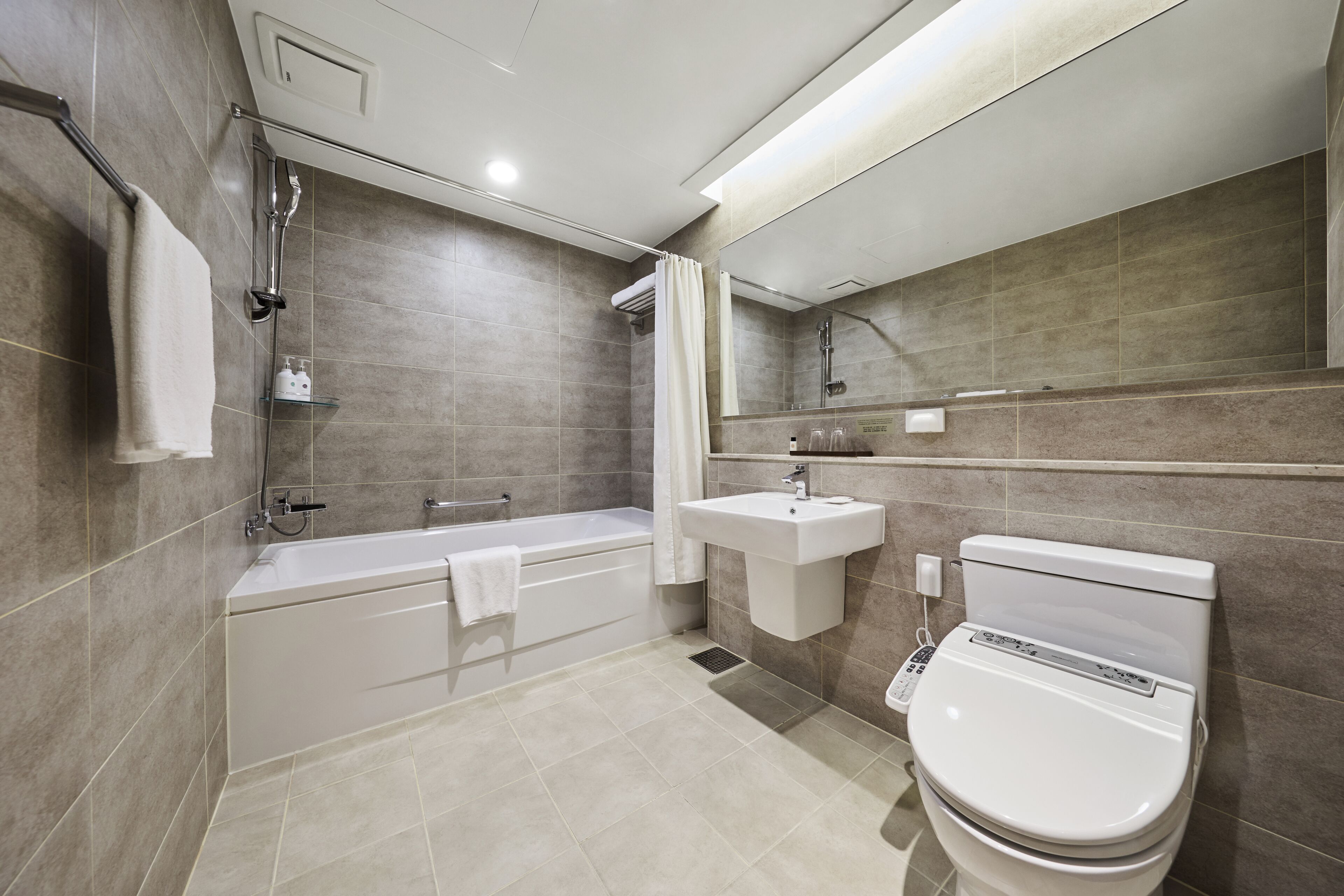 hair dryer, slippers, towels, soap