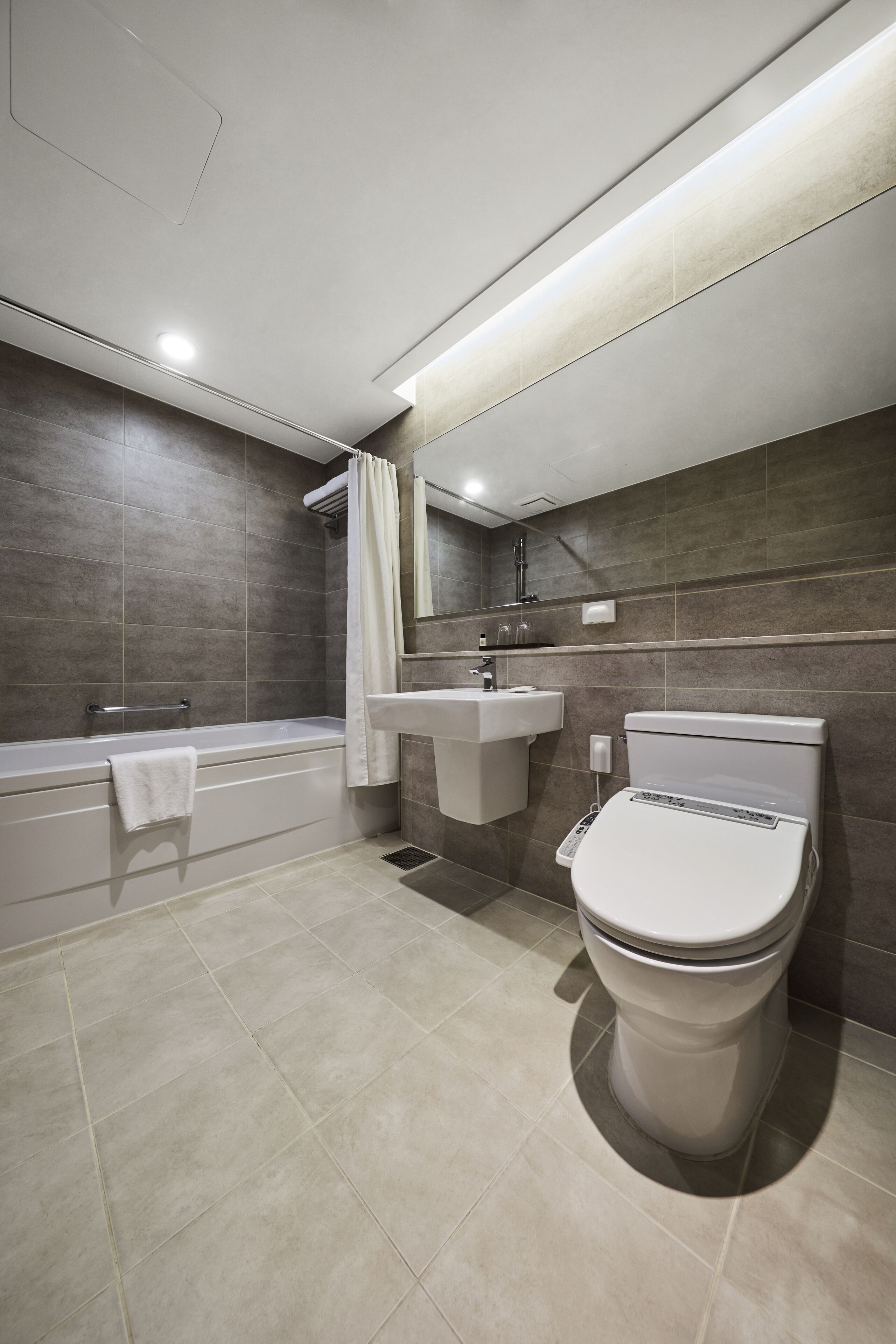 hair dryer, slippers, towels, soap