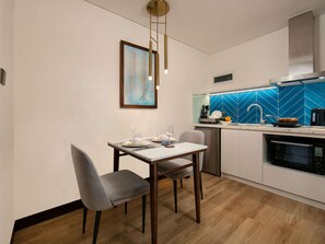 Junior Suite, 1 Double Bed | Minibar, in-room safe, desk, blackout drapes