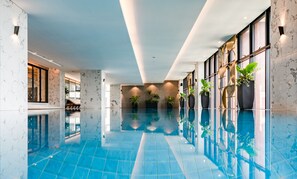 Indoor pool, open 6:00 AM to 8:00 PM, pool loungers