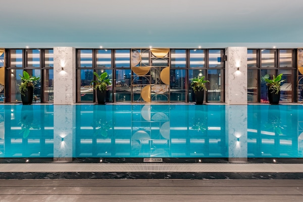 Indoor pool, open 6:00 AM to 8:00 PM, sun loungers