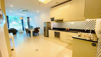 Two Bedrooms Apartment with City View | Living area | Flat-screen TV