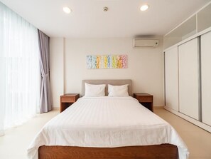 Apartment, 2 Bedrooms | In-room safe, desk, soundproofing, iron/ironing board - Glenwood Residences (Ho Chi Minh City)