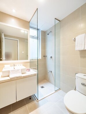 Shower, free toiletries, hair dryer, slippers