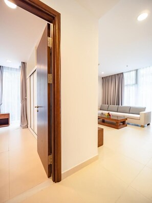 Apartment, 2 Bedrooms | In-room safe, desk, soundproofing, iron/ironing board - Glenwood Residences (Ho Chi Minh City)