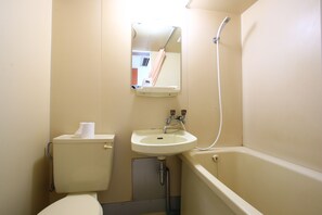 Single Room, Smoking | Bathroom | Combined shower/bathtub, deep-soaking bathtub, free toiletries - Hotel New Nishida (Tokunoshima)