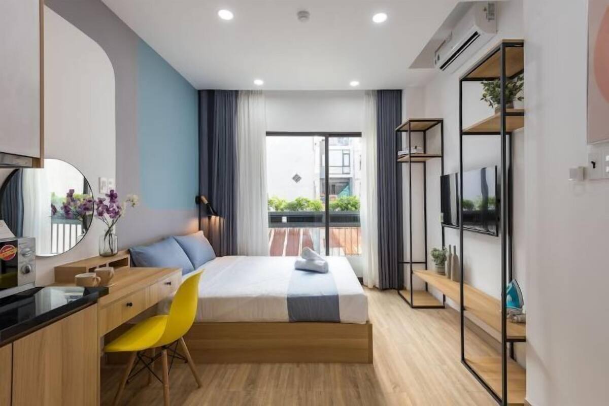 Minibar, desk, laptop workspace, iron/ironing board