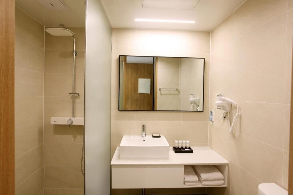 shower, free toiletries, hair dryer, bathrobes