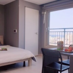 Ocean City View | Desk, laptop workspace, blackout curtains, soundproofing - Ara Palace Hotel (Jeju City)