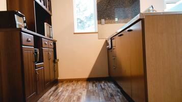 Holiday Home | Private kitchen | Full-sized fridge, microwave, stovetop, coffee/tea maker