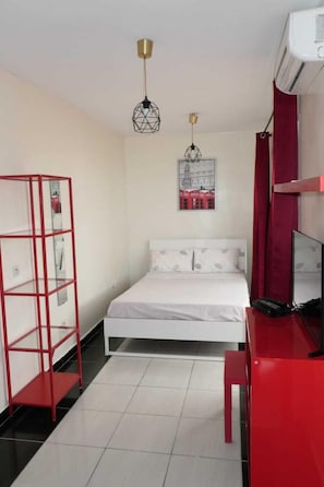 Suite Confort (5) | Colchones con acolchado adicional y tabla de planchar con plancha