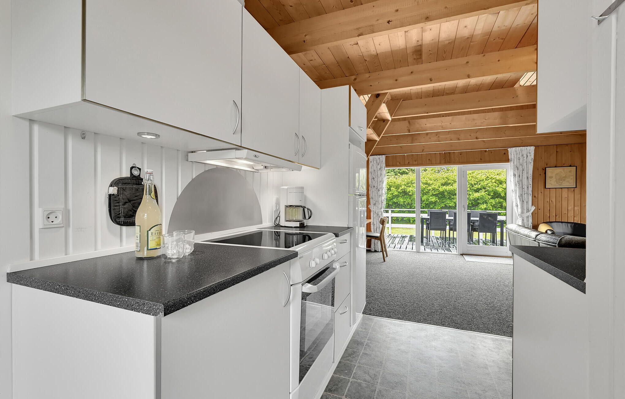 Fridge, stovetop, dishwasher, coffee/tea maker