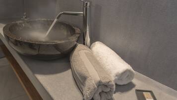 Combined shower/tub, hair dryer, towels, soap