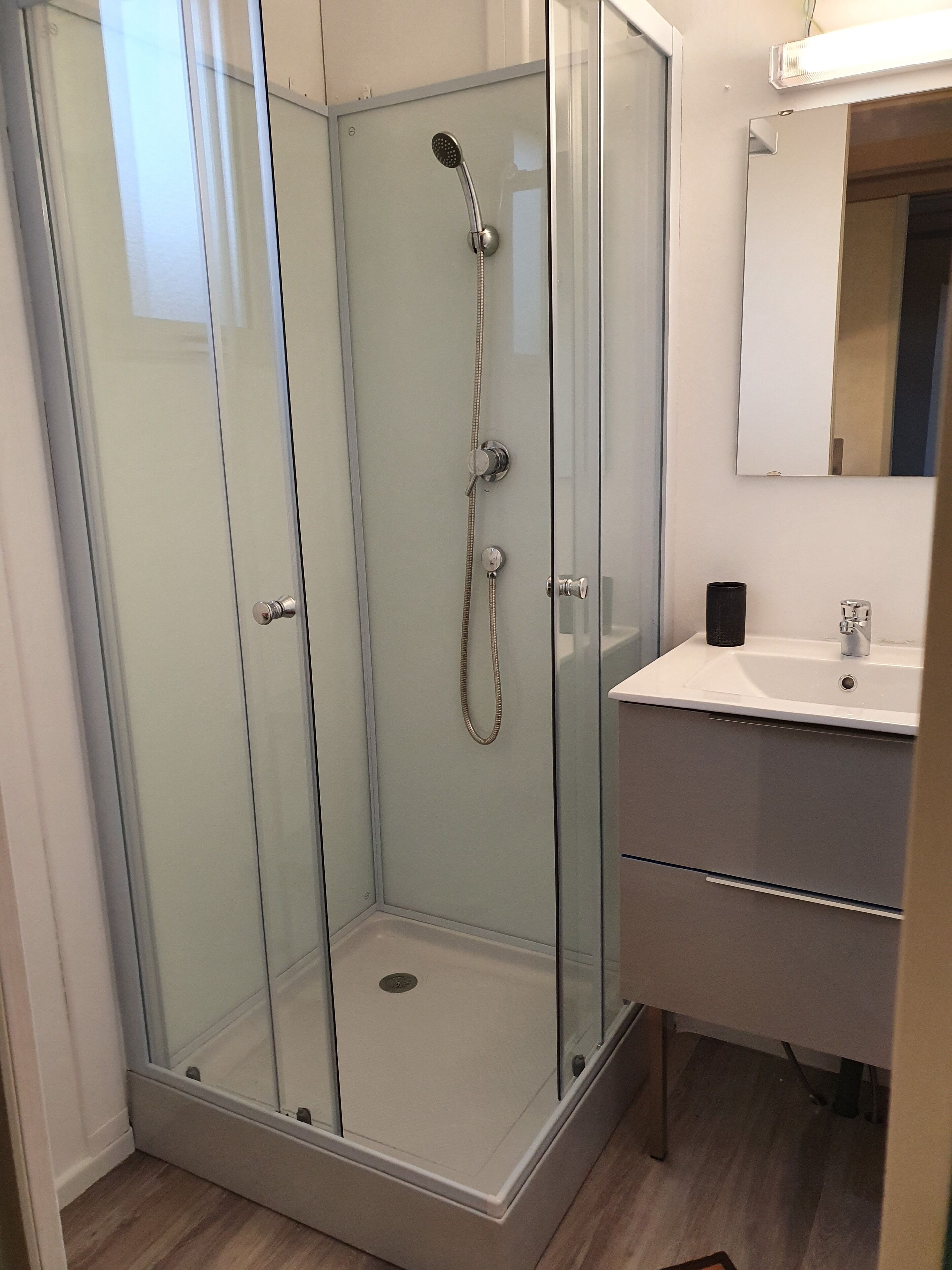 Shower, hair dryer, soap, shampoo