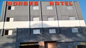 A building with the sign "Borges Hotel" at the top.