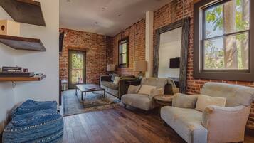 Flat-screen TV, fireplace, music library, stereo