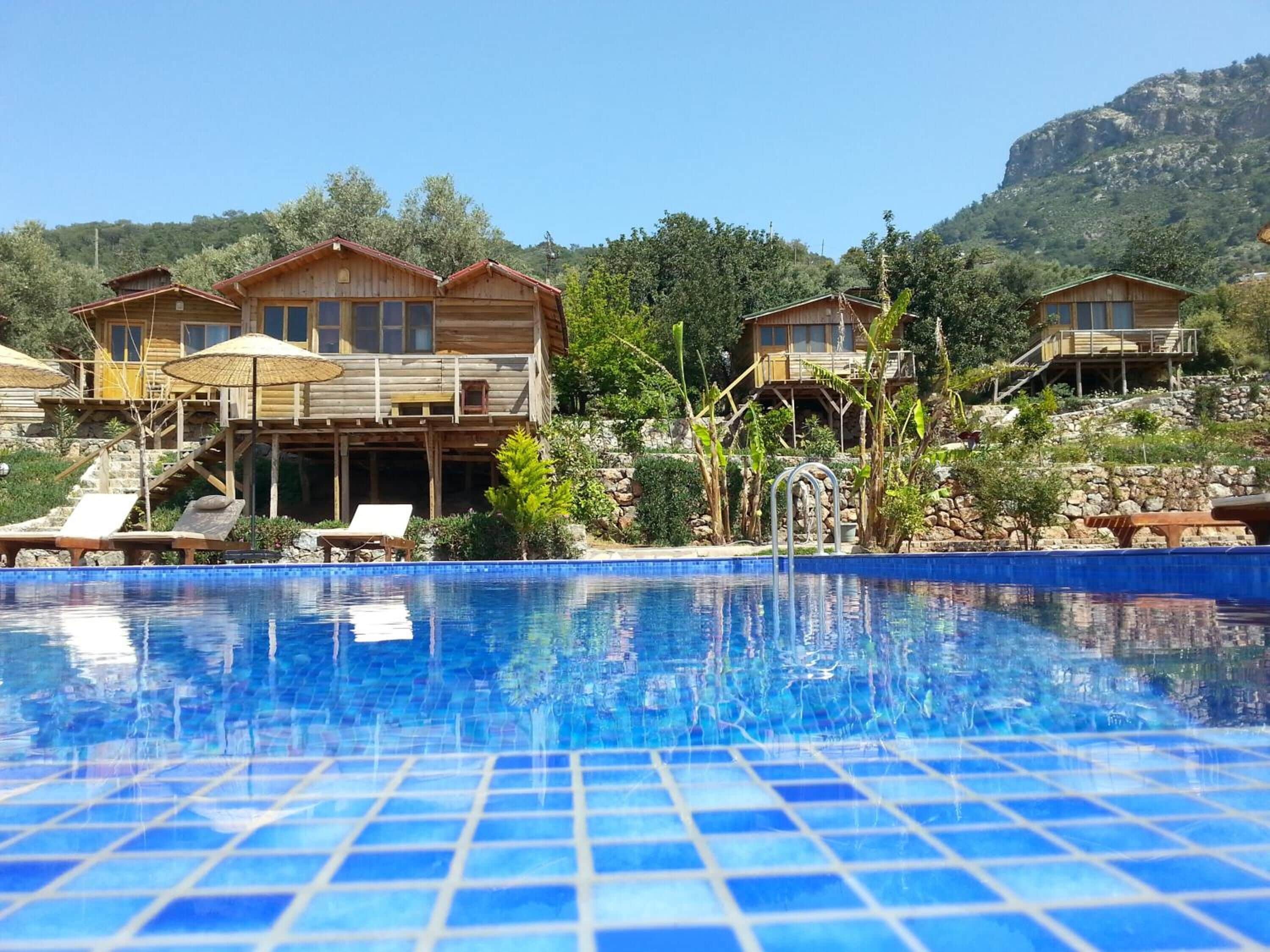 Seasonal outdoor pool, pool umbrellas, sun loungers