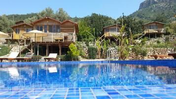 Seasonal outdoor pool, pool umbrellas, sun loungers