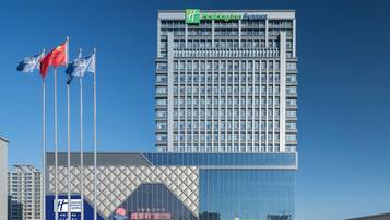 A multi-story building with a prominent Holiday Inn Express sign.