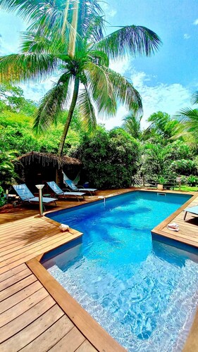 Atemoya lodges. Swimming pool, beach 400 m., Cinnamon (4p), A/C, pool, beautiful garden, beach 400 m