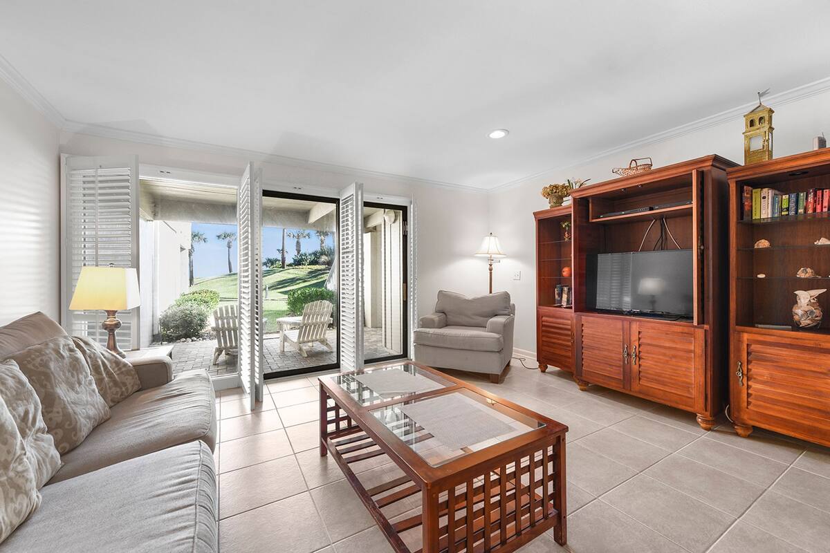 Condo, 1 Bedroom | Living room | Flat-screen TV