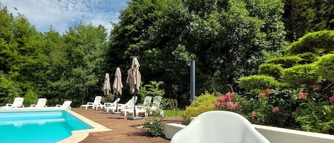 Seasonal outdoor pool, open 10:00 AM to 8:00 PM, sun loungers