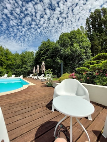 Seasonal outdoor pool, open 10:00 AM to 8:00 PM, sun loungers