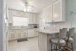 Cottage, Multiple Beds, Patio, Beach View | Private kitchen | Fridge, microwave, oven, stovetop