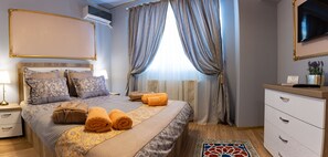 1 غرفة نوم وخزنة داخل الغرفة ومكواة/لوح كي وواي فاي