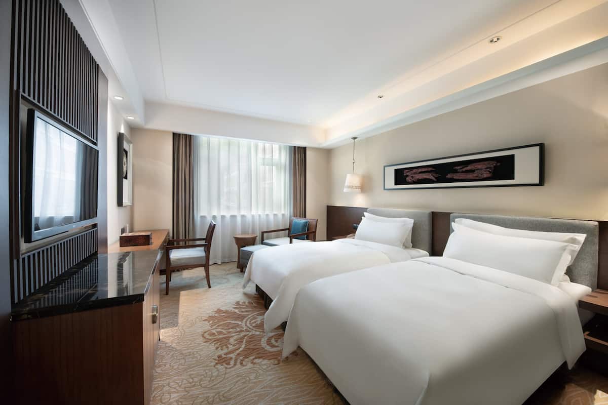 Blackout drapes, WiFi (free), bed sheets