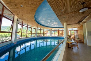 Indoor pool, open 6:30 AM to 8:00 PM, pool loungers