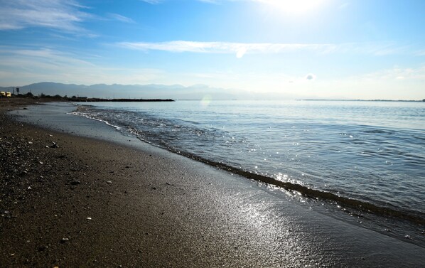 On the beach, beach towels