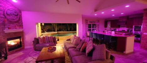 TV, fireplace, books