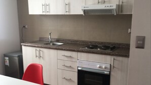 Studio Apartment | Private kitchen - Adriatica Departamentos (Antofagasta)