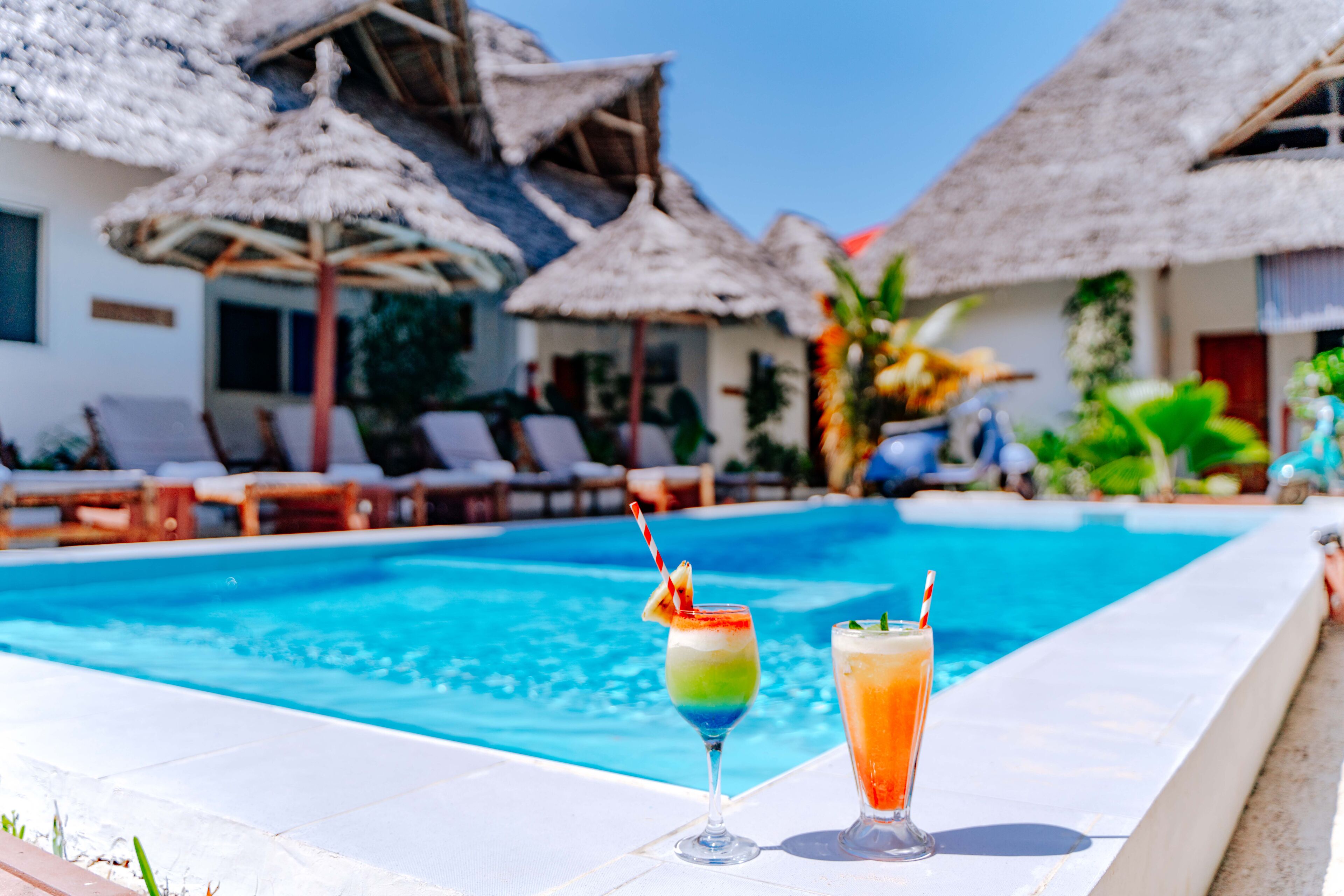 Outdoor pool, pool umbrellas, sun loungers