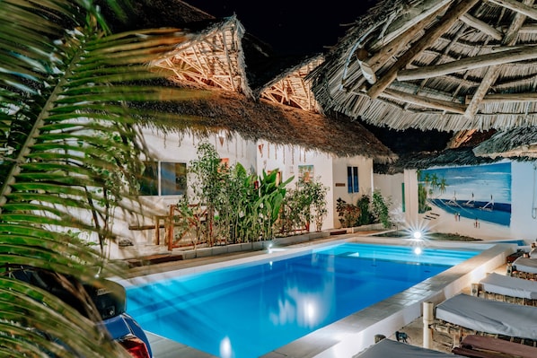 Outdoor pool, pool umbrellas, pool loungers