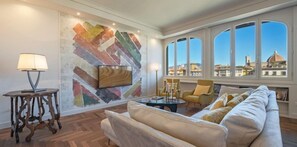 Apartment | Living area | 32-inch TV with digital channels - Dreams Over Ponte Vecchio (Florence)
