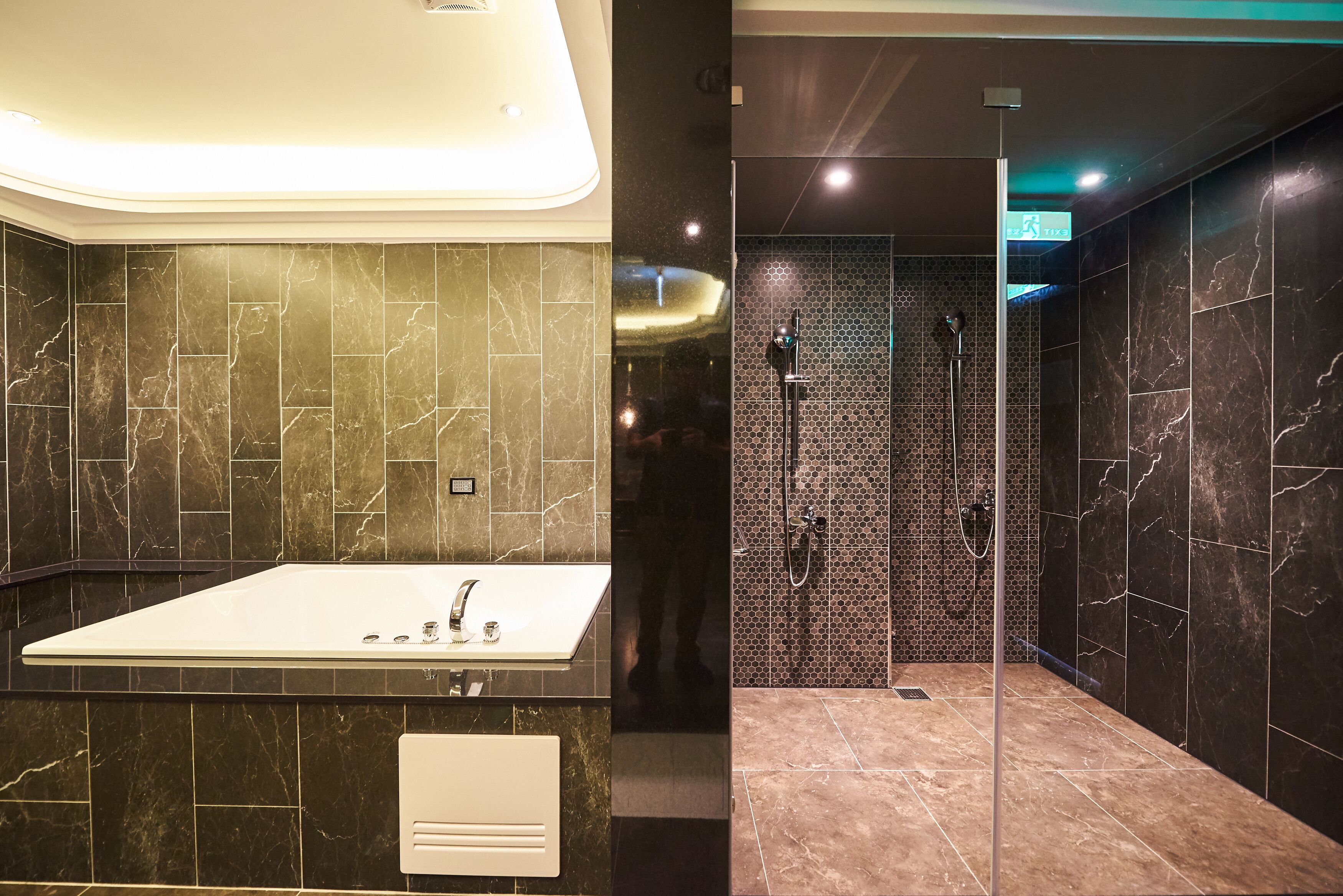 vip room(check in time  8pm) | bathroom | jetted bath, rainfall showerhead, free toiletries, hair dryer