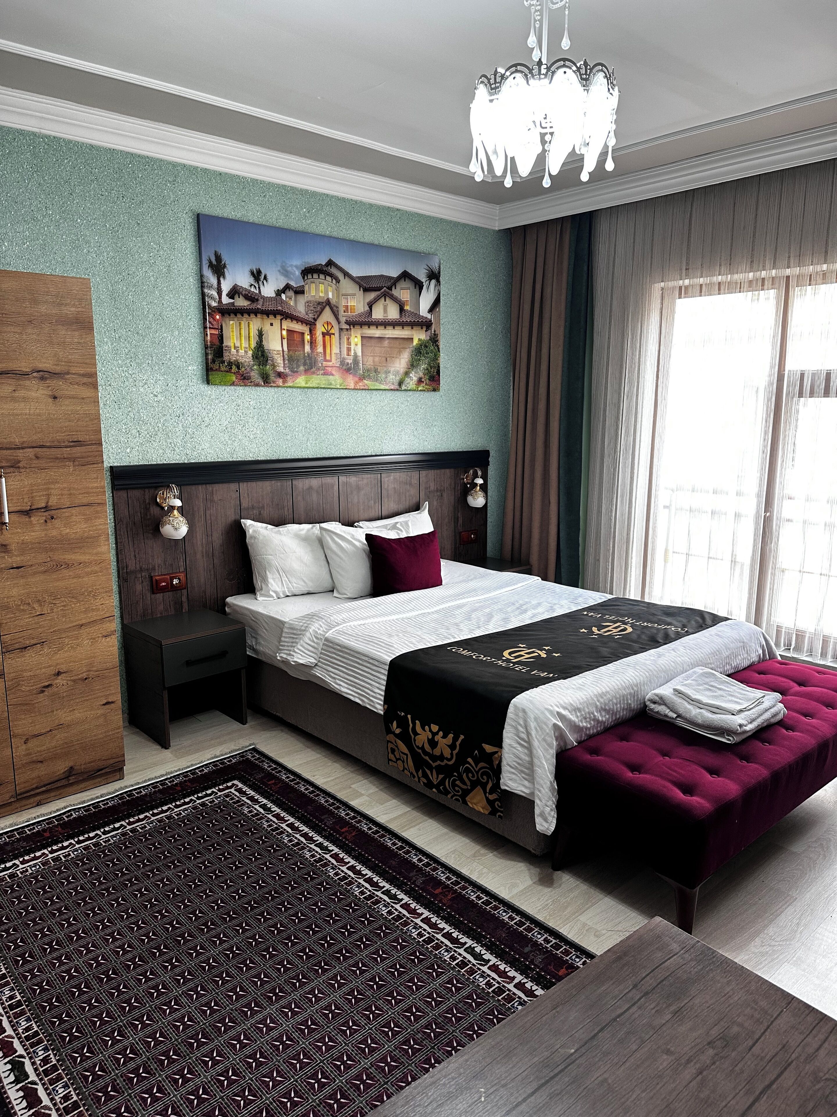 Quadruple Room | Minibar, individually decorated, desk, laptop workspace