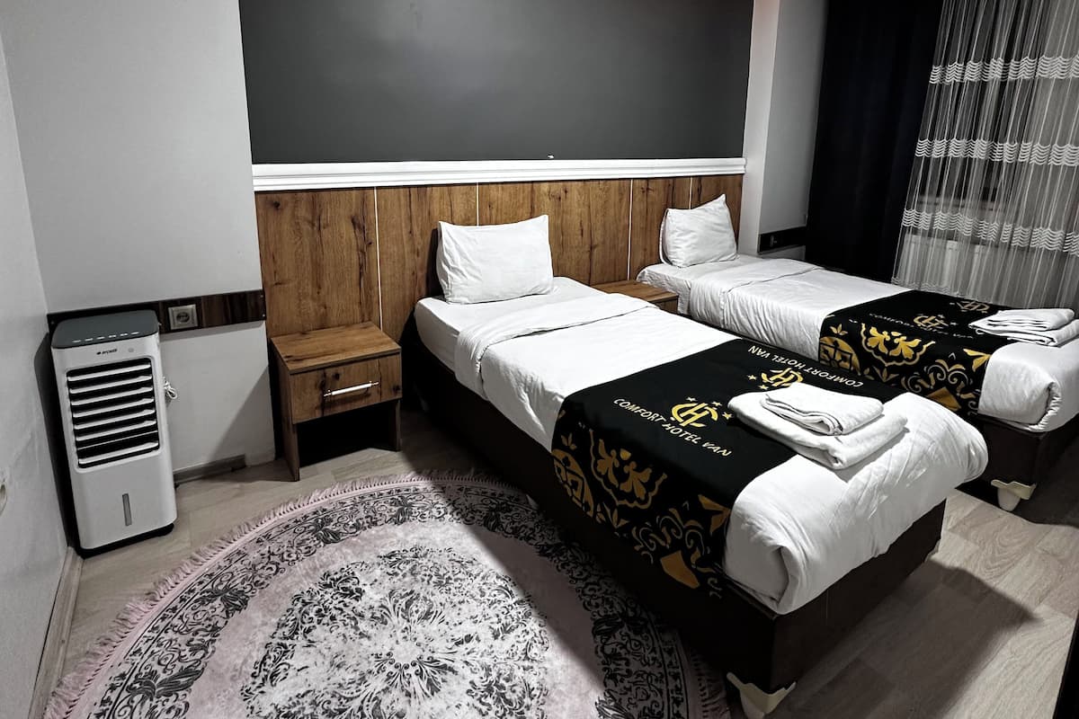 Værelse til 4 personer | 1 soveværelse, minibar, individuelt design, skrivebord