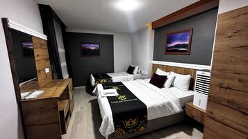 Senior Suite | Minibar, individually decorated, desk, laptop workspace