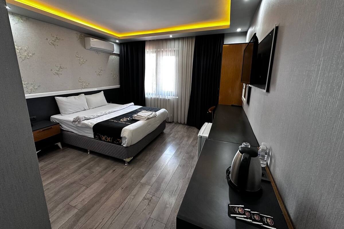 Minibar, desk, laptop workspace, blackout curtains