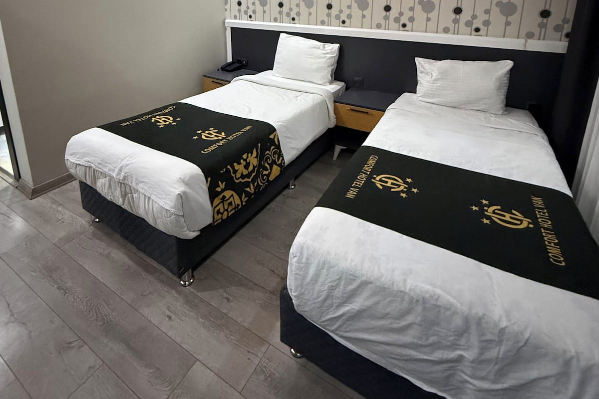 Double or Twin Room | Minibar, desk, laptop workspace, blackout curtains